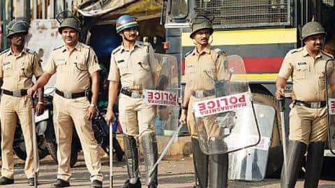 Mob manhandles cops for opposing gathering, around 15 booked Mob manhandles cops for opposing gathering, around 15 booked