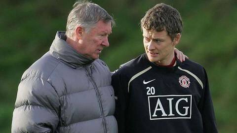 Sir Alex Ferguson encourages Manchester United's coaching staff at training Sir Alex Ferguson encourages Manchester United's coaching staff at training