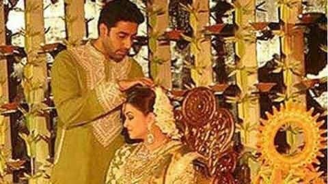 Abhishek and Aishwarya color co-ordinated their attires for the function Abhishek and Aishwarya color co-ordinated their attires for the function
