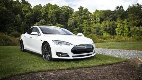 Musk says Tesla cars could soon run third-party apps, games Musk says Tesla cars could soon run third-party apps, games