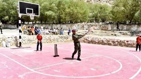 MS Dhoni plays cricket in Leh with kids MS Dhoni plays cricket in Leh with kids