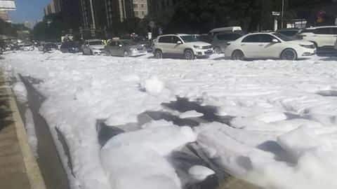 White foam covers entire street, changes China town into Iceland! White foam covers entire street, changes China town into Iceland!