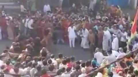 MP: Crowd gathers to welcome monk; social distancing norms violated MP: Crowd gathers to welcome monk; social distancing norms violated