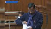 Arvind Kejriwal tears copies of farm laws in Delhi Assembly