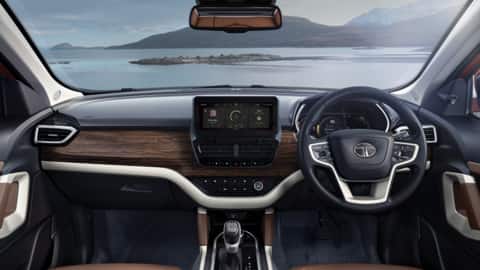The SUV features a signature Oak Brown faux wood dashboard