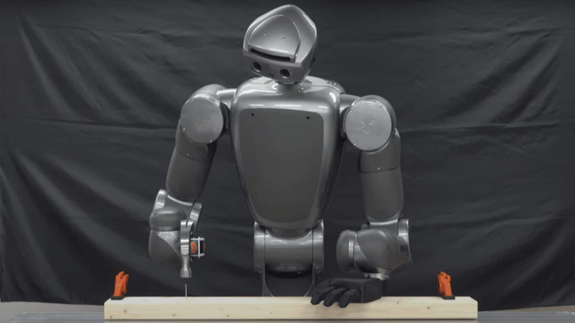 This humanoid Japanese robot can accurately hammer nail in wood