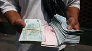 Iran's currency nears 2M to a dollar as pressure mounts