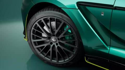 The SUV features swan doors and green-colored brake calipers