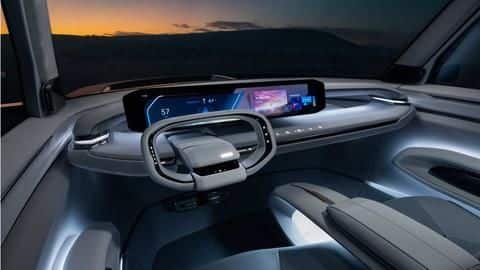 There is a panoramic glass roof and a 27-inch display