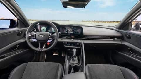 There is a multifunctional steering wheel and an infotainment system