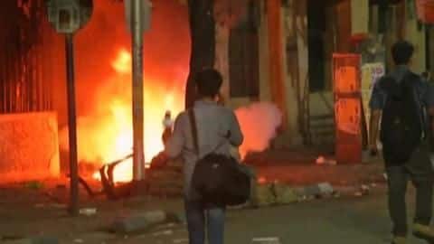BJP and TMC supporters clashed during Shah's roadshow BJP and TMC supporters clashed during Shah's roadshow