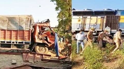 Train rams into vehicles at open level crossing, five dead Train rams into vehicles at open level crossing, five dead