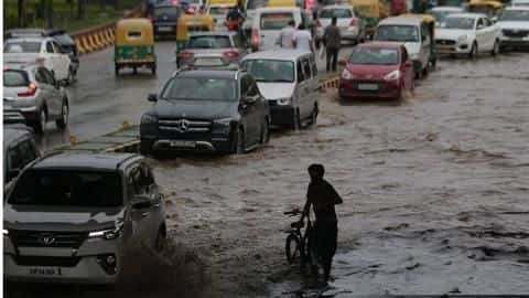 Delhi: Bus gets trapped at waterlogged underpass, 40 passengers rescued Delhi: Bus gets trapped at waterlogged underpass, 40 passengers rescued