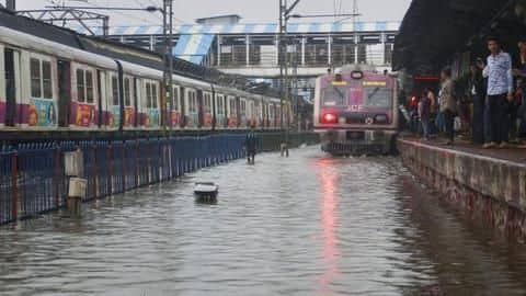 Monsoon reaches Mumbai; local train services hit after heavy rains Monsoon reaches Mumbai; local train services hit after heavy rains