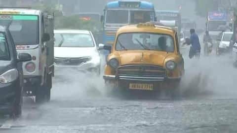 Heavy rain batters Bengal, leaves arterial roads waterlogged Heavy rain batters Bengal, leaves arterial roads waterlogged