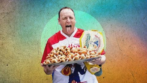 American competitive eater finishes 63 hot dogs in 10 minutes American competitive eater finishes 63 hot dogs in 10 minutes