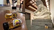 Why were hundreds of 'urine' bottles placed inside Met museum?