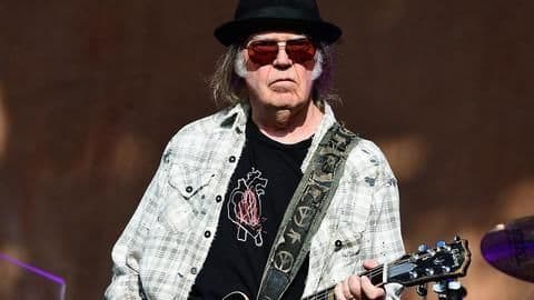 Spotify removes Neil Young's music following Joe Rogan row Spotify removes Neil Young's music following Joe Rogan row