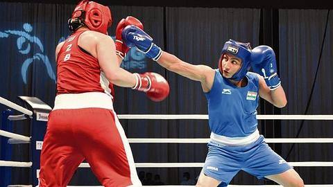 Asian Boxing Championships: Pooja strikes gold; silver for Mary Kom Asian Boxing Championships: Pooja strikes gold; silver for Mary Kom