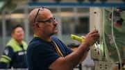 US unemployment rate drops amid job cuts 