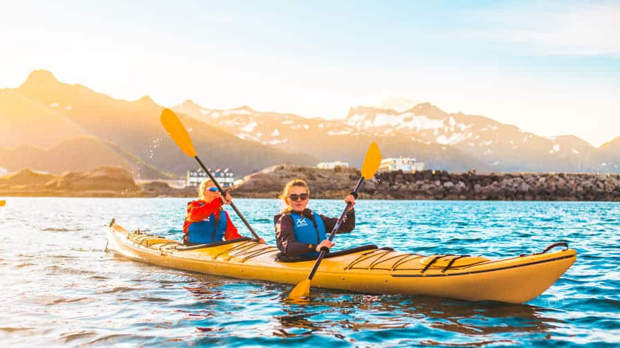 Experience midnight sun kayaking in Lofoten, Norway