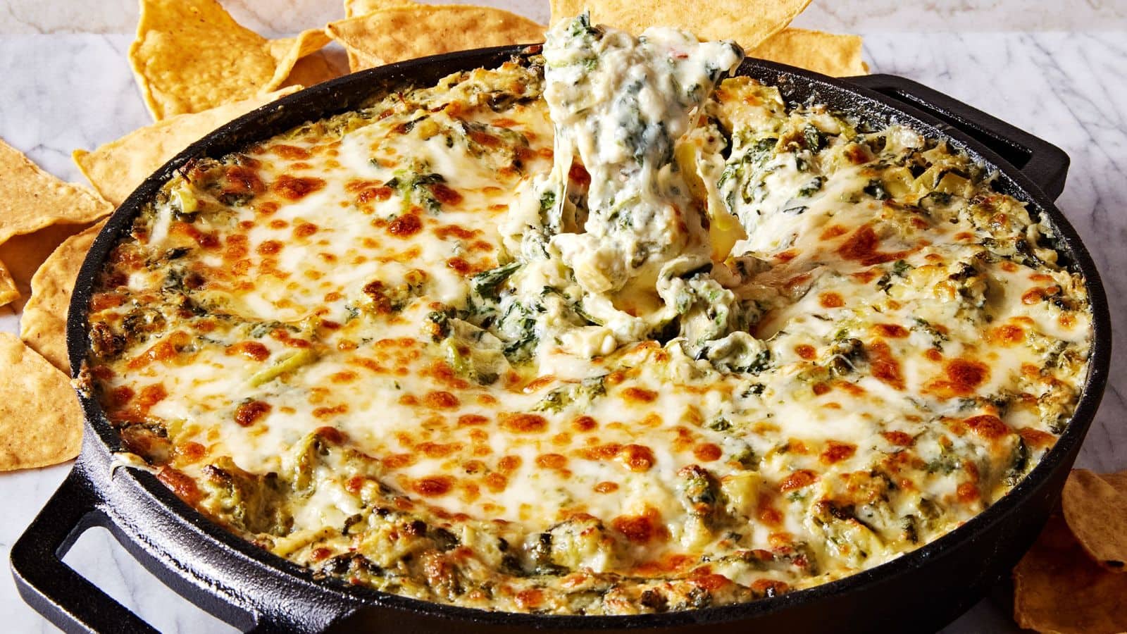 Impress your guests with this decadent spinach artichoke pizza recipe