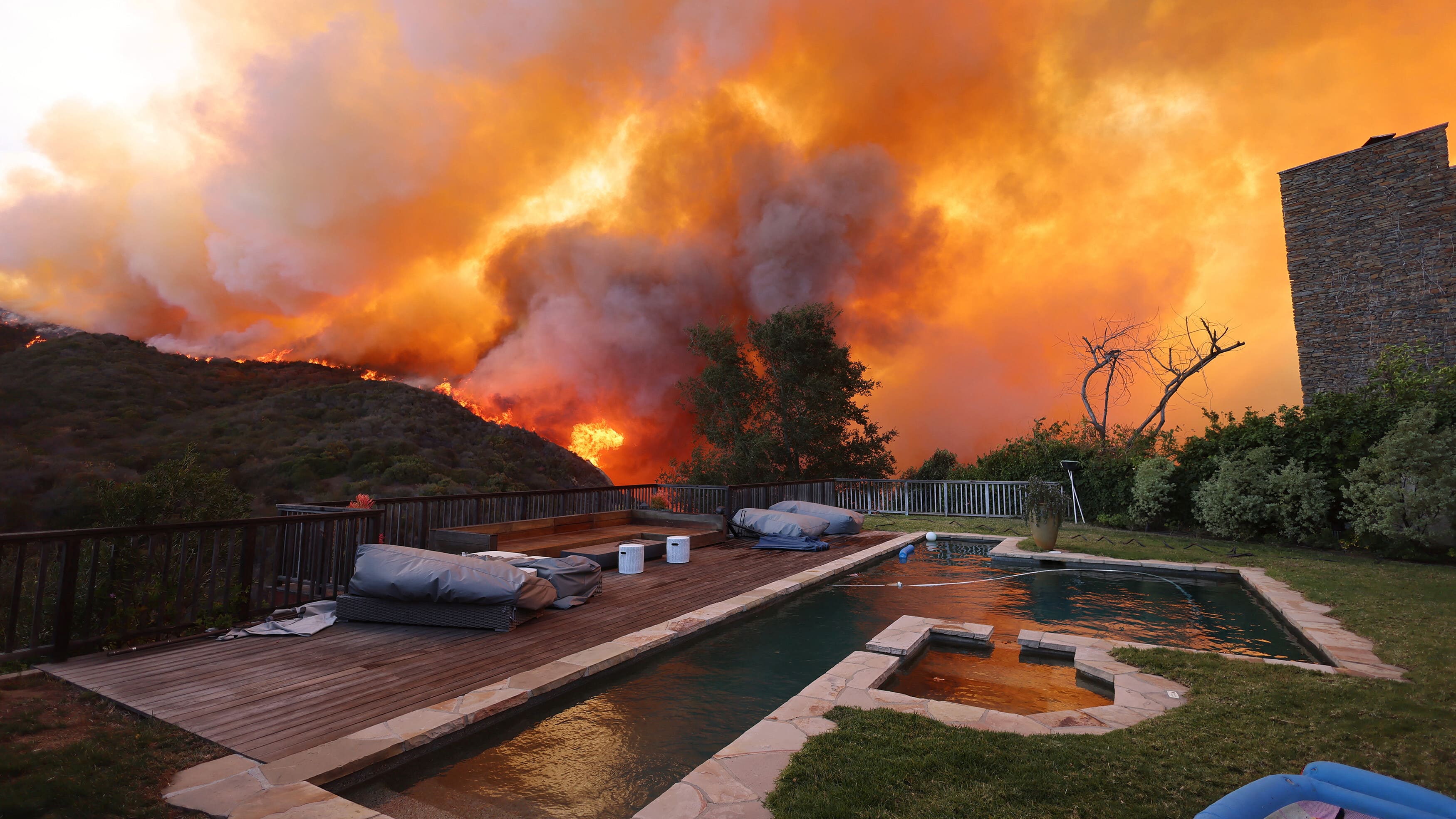 Hydrants run dry as wildfire burns LA city; 5 dead  