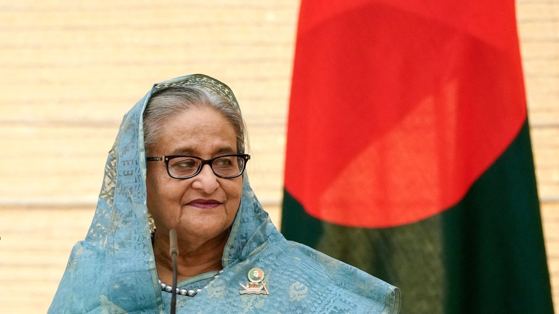 Ex-Bangladesh PM Sheikh Hasina will return for elections, says son