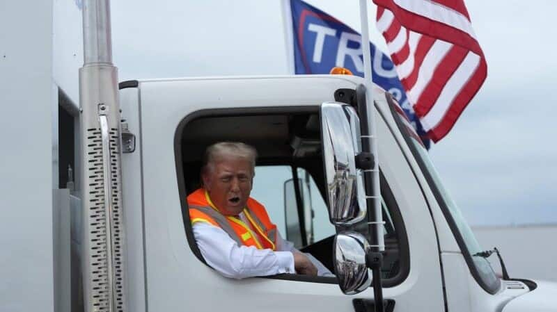 Trump rides in garbage truck 'in honor of Kamala, Biden'