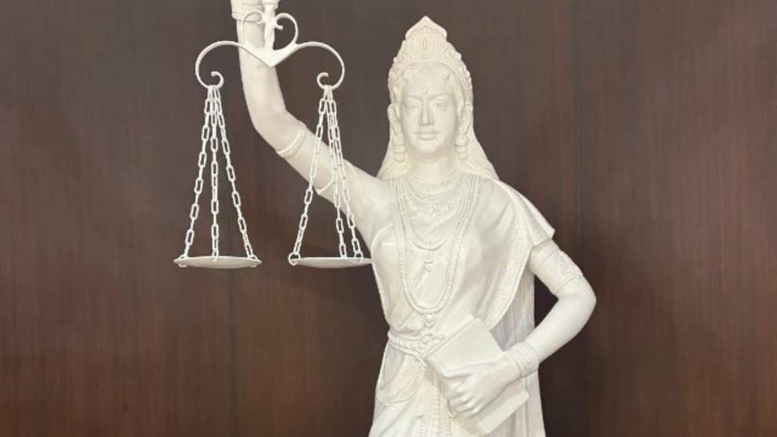 Why Supreme Court's new Lady Justice has removed her blindfold 