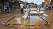Dressed as astronauts, Jaipur residents protest against potholes