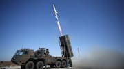 Japan test-fires missile from home soil for first time 