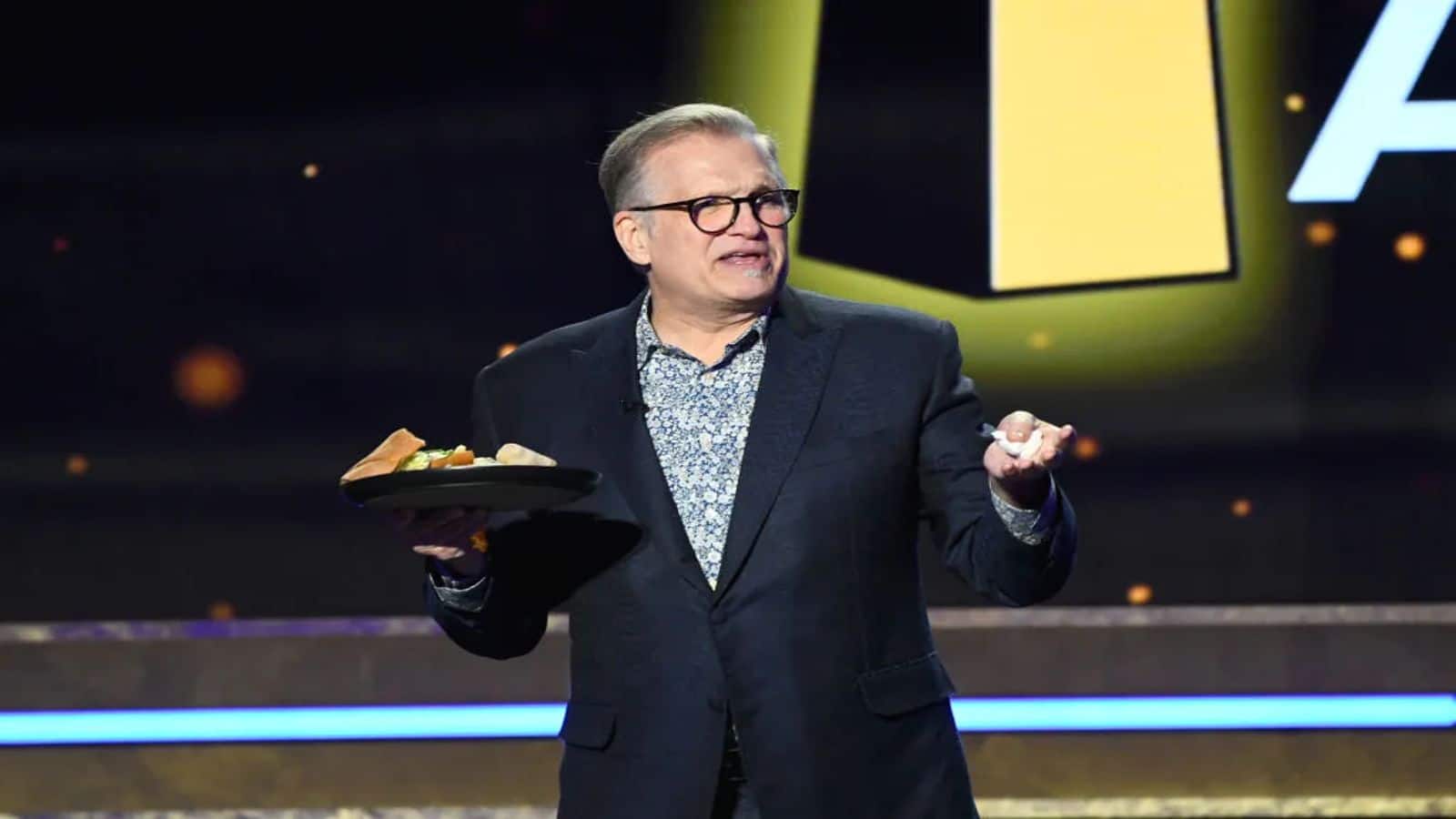 Drew Carey stands with striking writers, reveals funding their meals