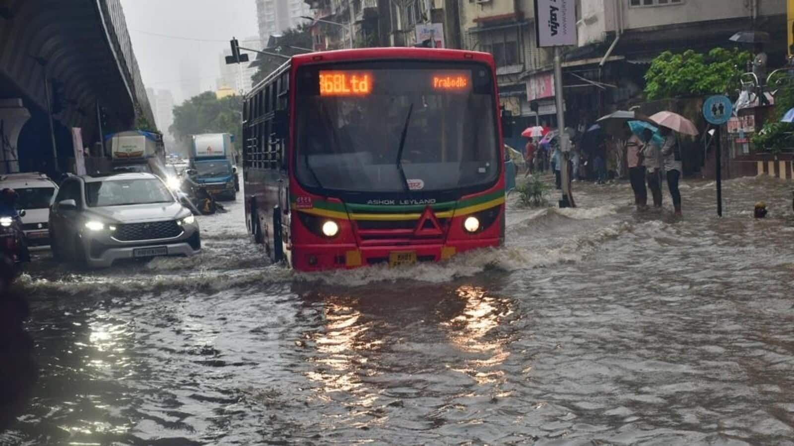 Mumbai waterlogged after morning rain, local trains hit