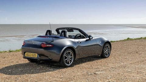 The car features a neatly-folding fabric roof