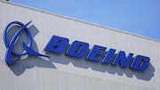 Boeing posts smaller Q2 loss as jet production ramps up