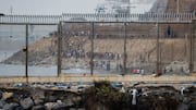 Spain begins installing floating barrier after massive migrant influx