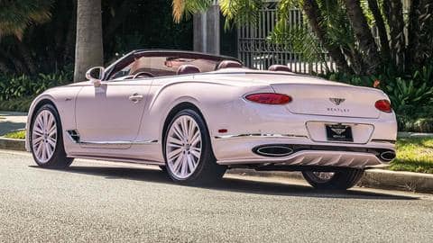The convertible flaunts a large chromed grille and designer wheels