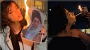 Why Iranian women are lighting cigarettes with Khamenei's burning photos