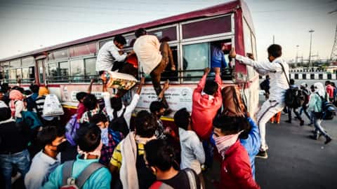 Overcrowded bus ferrying migrants from Delhi overturns, three die Overcrowded bus ferrying migrants from Delhi overturns, three die