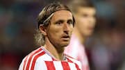 Embarrassed Luka Modric reacts to Croatia's 7-0 loss against England