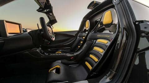 The hypercar uses carbon fiber chassis and Alcantara upholstery