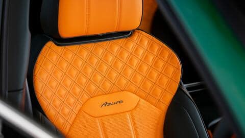Exclusive 'Scarab Green' exterior and dual-tone interior