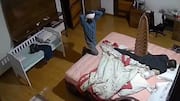 Video: Ex-judge's son sleeps on while robbers loot his room 