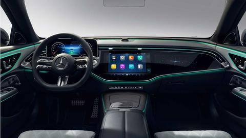 It features three screens and a dashboard-mounted selfie camera