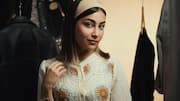 Try these stylish ways to wear a headband