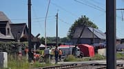 Several reported dead after train hits school bus in Belgium 