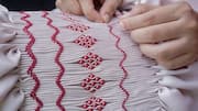 Smocking: The embroidery trick that makes fabric stretch