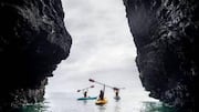 Explore Tasmania's remote sea caves by kayak 