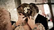 Add flowers to your bun with these stylish ideas